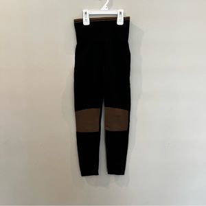 Olympia black leggings in size S.